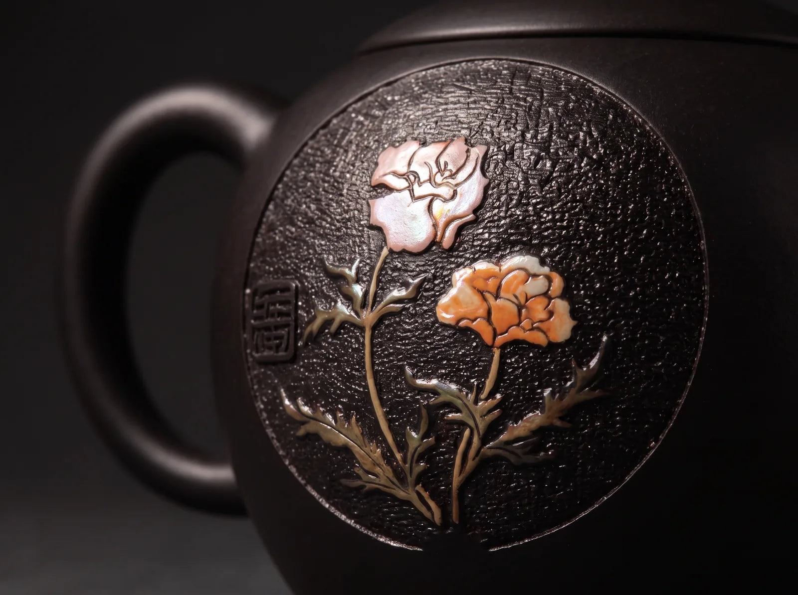 Black Pearl Blossom: pearl-like floral detail against dark purple clay