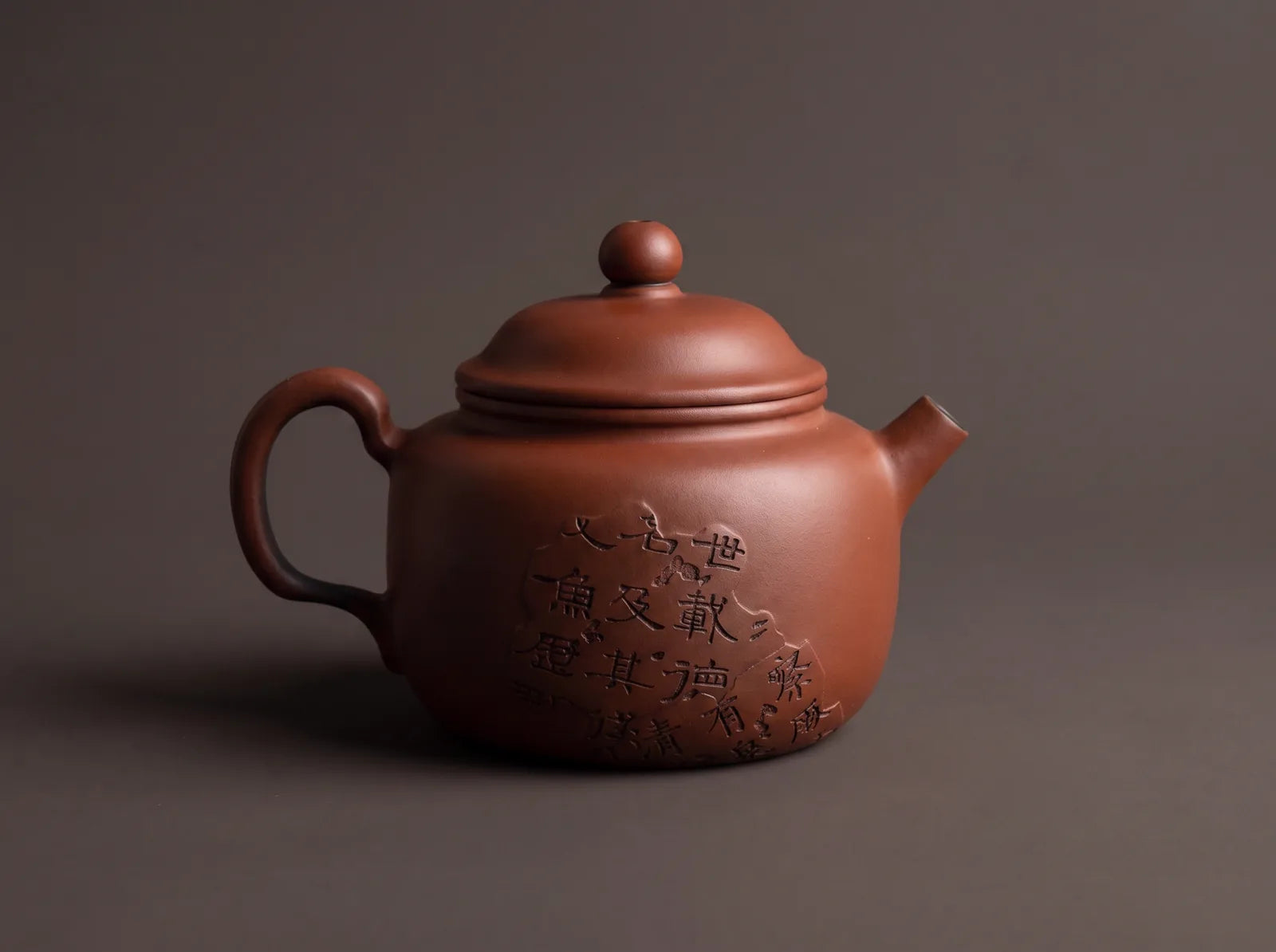 Calligraphy Vessel: upright purple-clay body, fitted lid, and restrained pouring profile