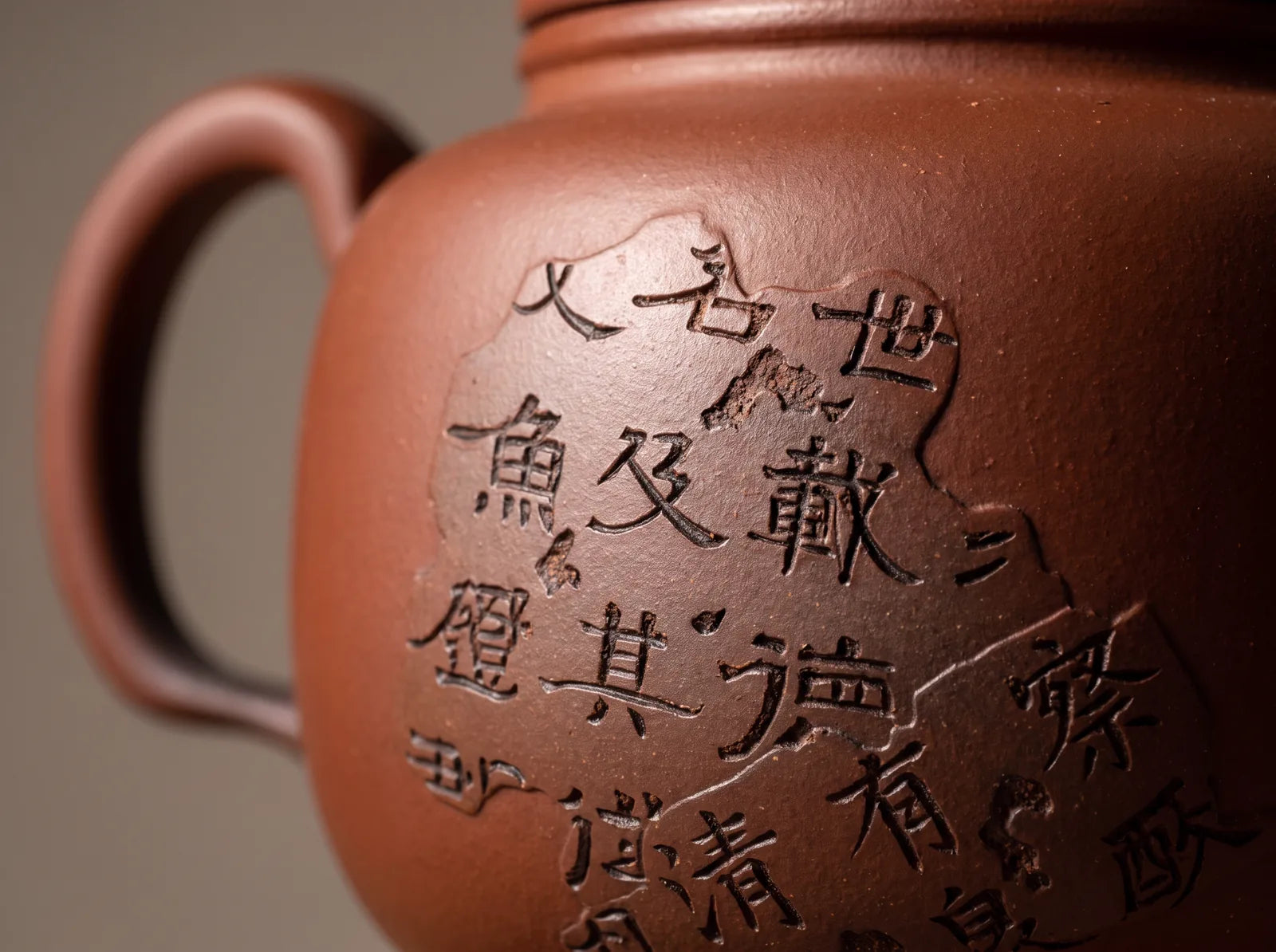 Calligraphy Vessel: incised calligraphic lines and filled lettering in close view