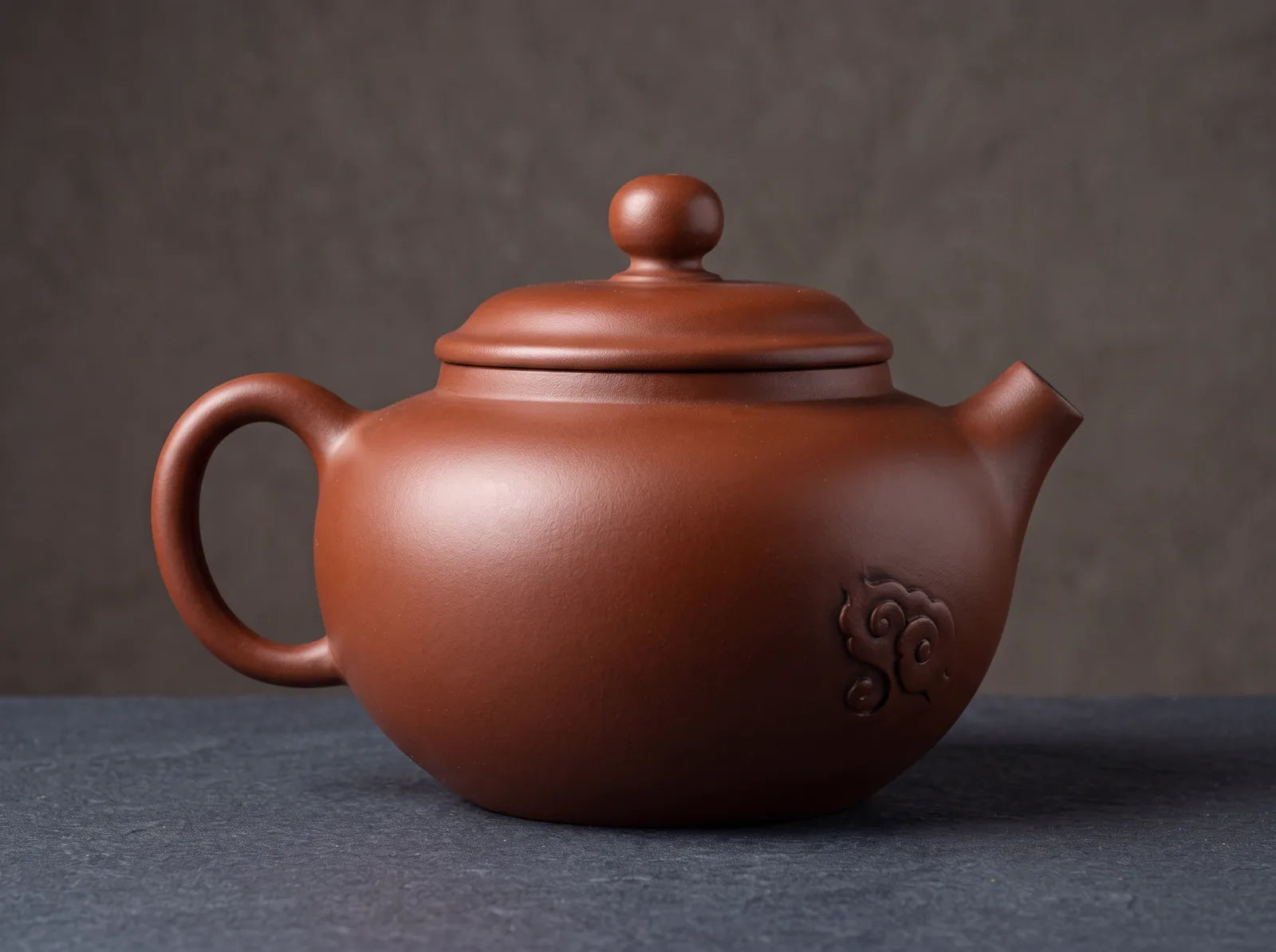 Cloud Grace: flowing cloud-line decoration across polished purple clay