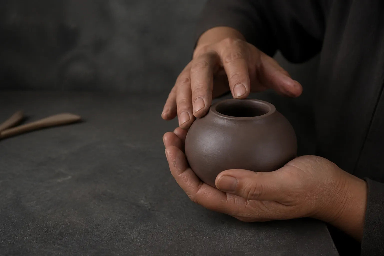 The vessel begins in the palm.