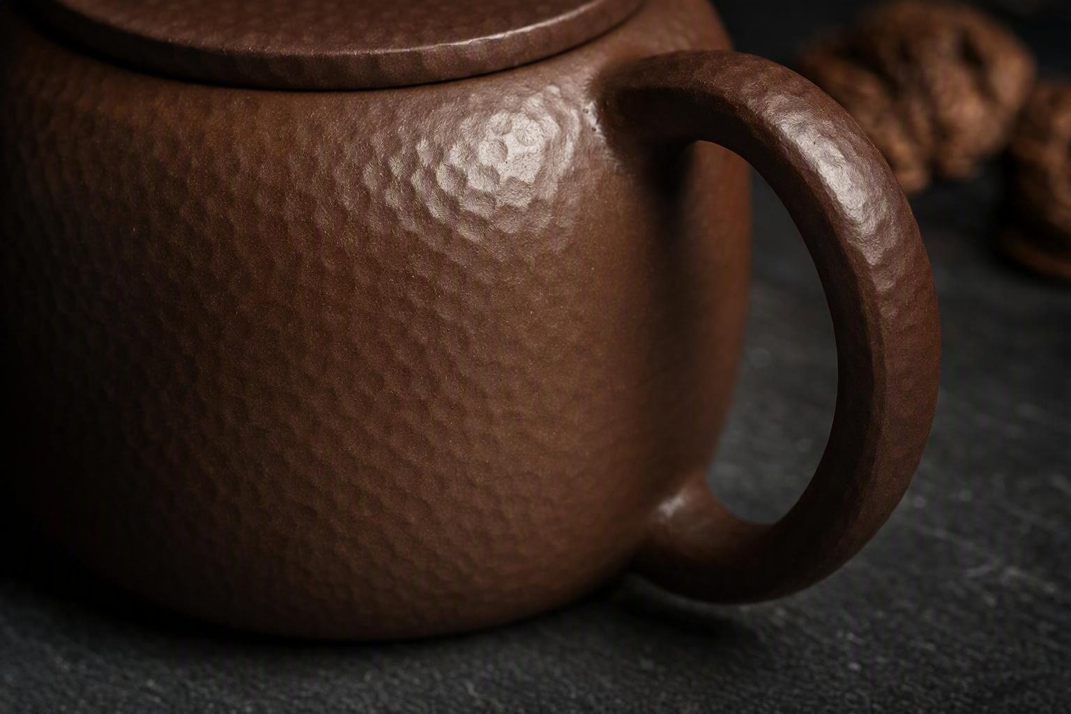 Hammered Earth No. 3: close view of hand-hammered texture across purple clay