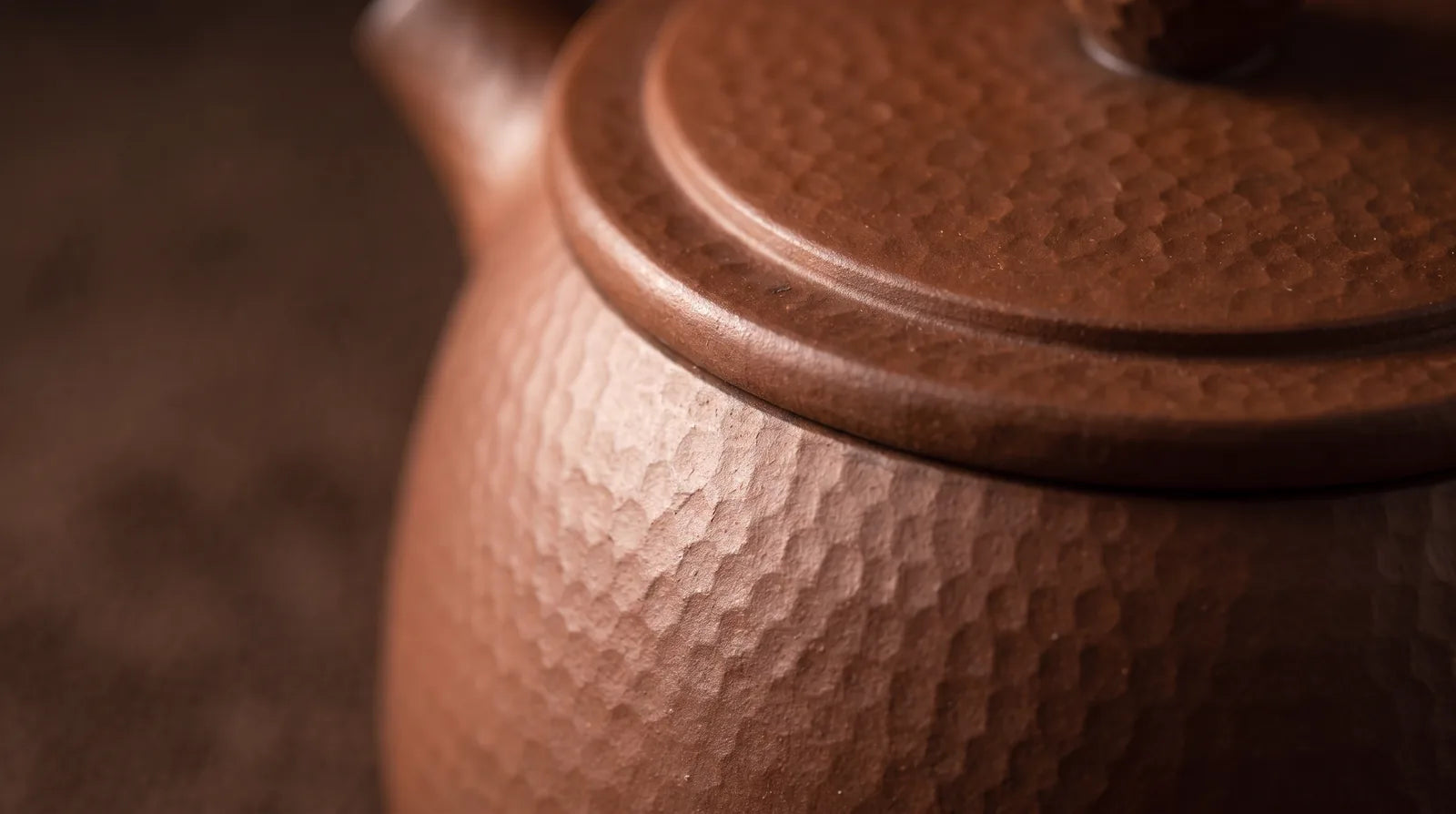 Hammered Earth No. 7: upright hammered body and balanced circular handle