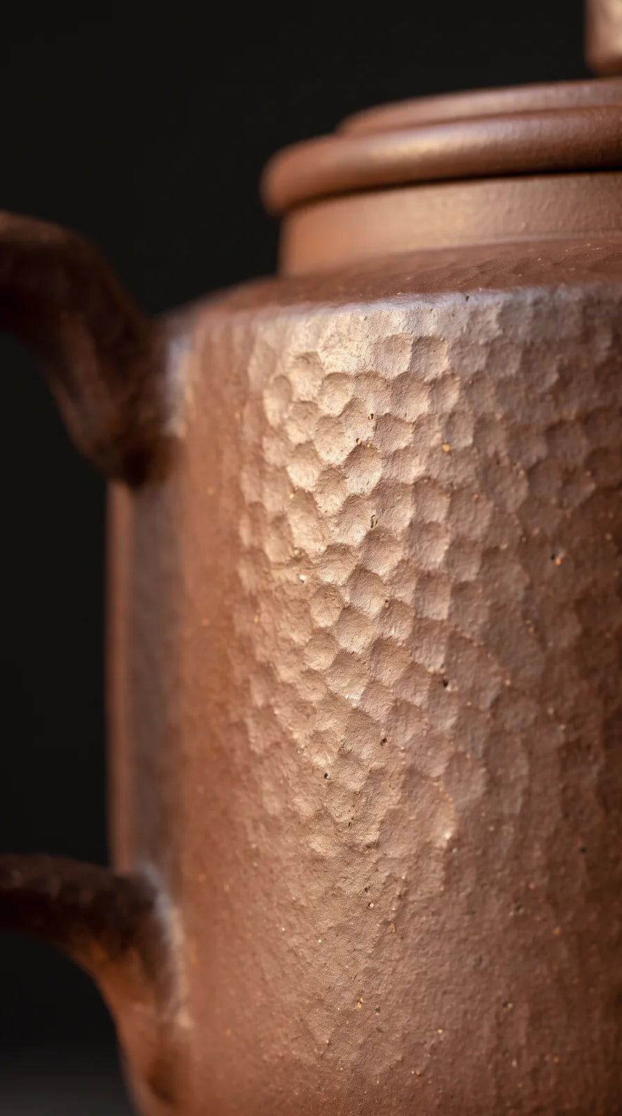 Hammered Earth: close view of the unglazed purple-clay texture