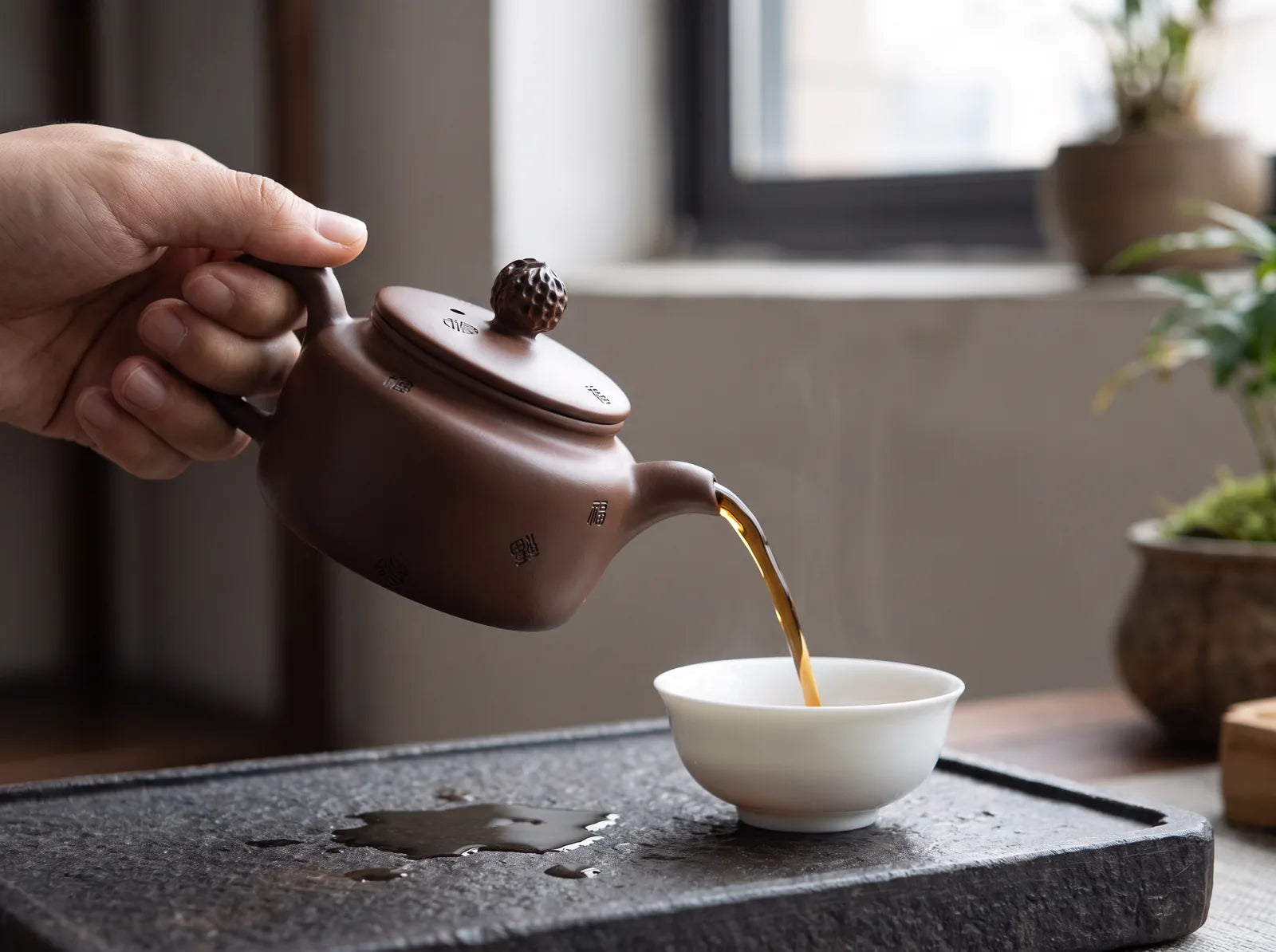 The handle and spout from the pouring side
