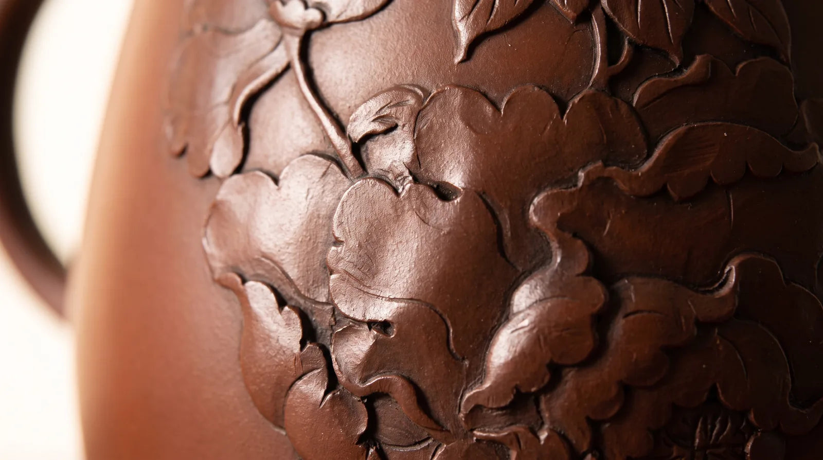 Jianshui – Lotus Relief Teapot in an editorial setting