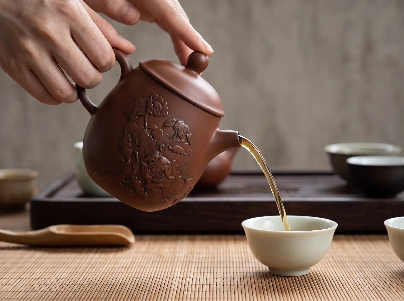 The handle and spout from the pouring side