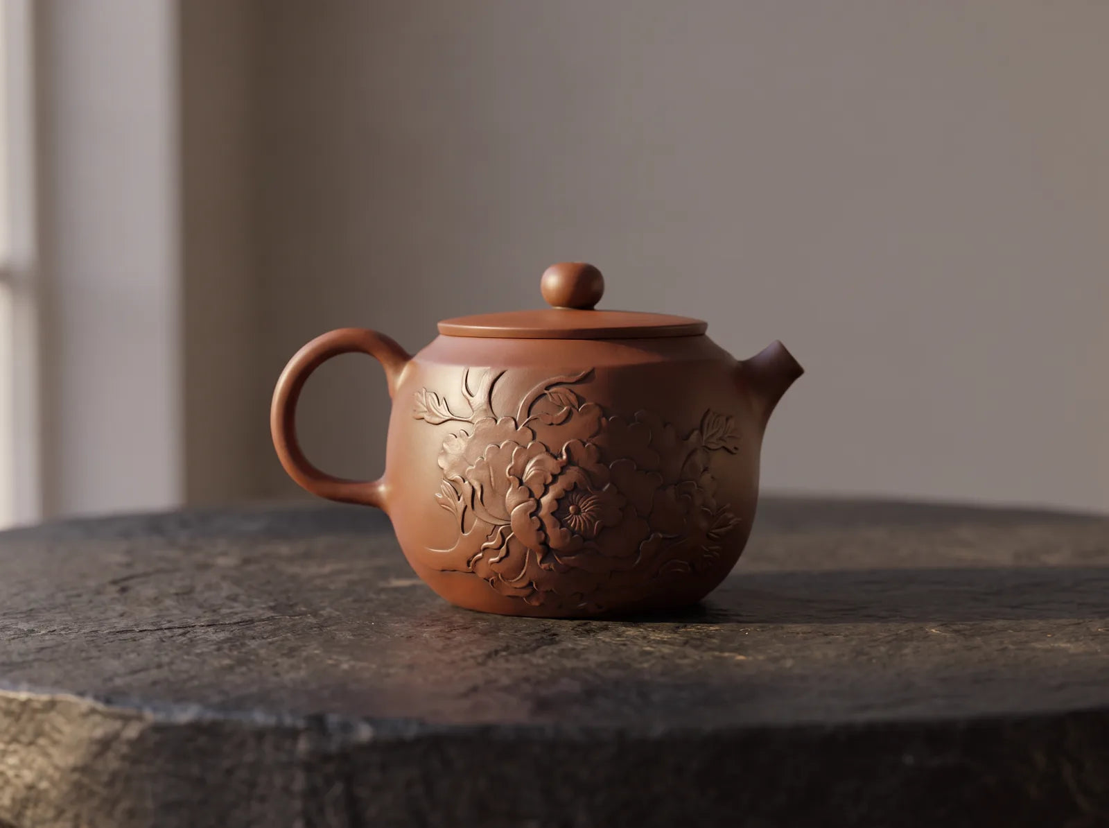 A close view of the surface decoration and clay finish