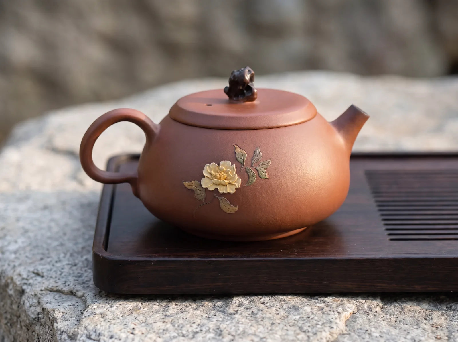 Jianshui – Stone Blossom Teapot in an editorial setting